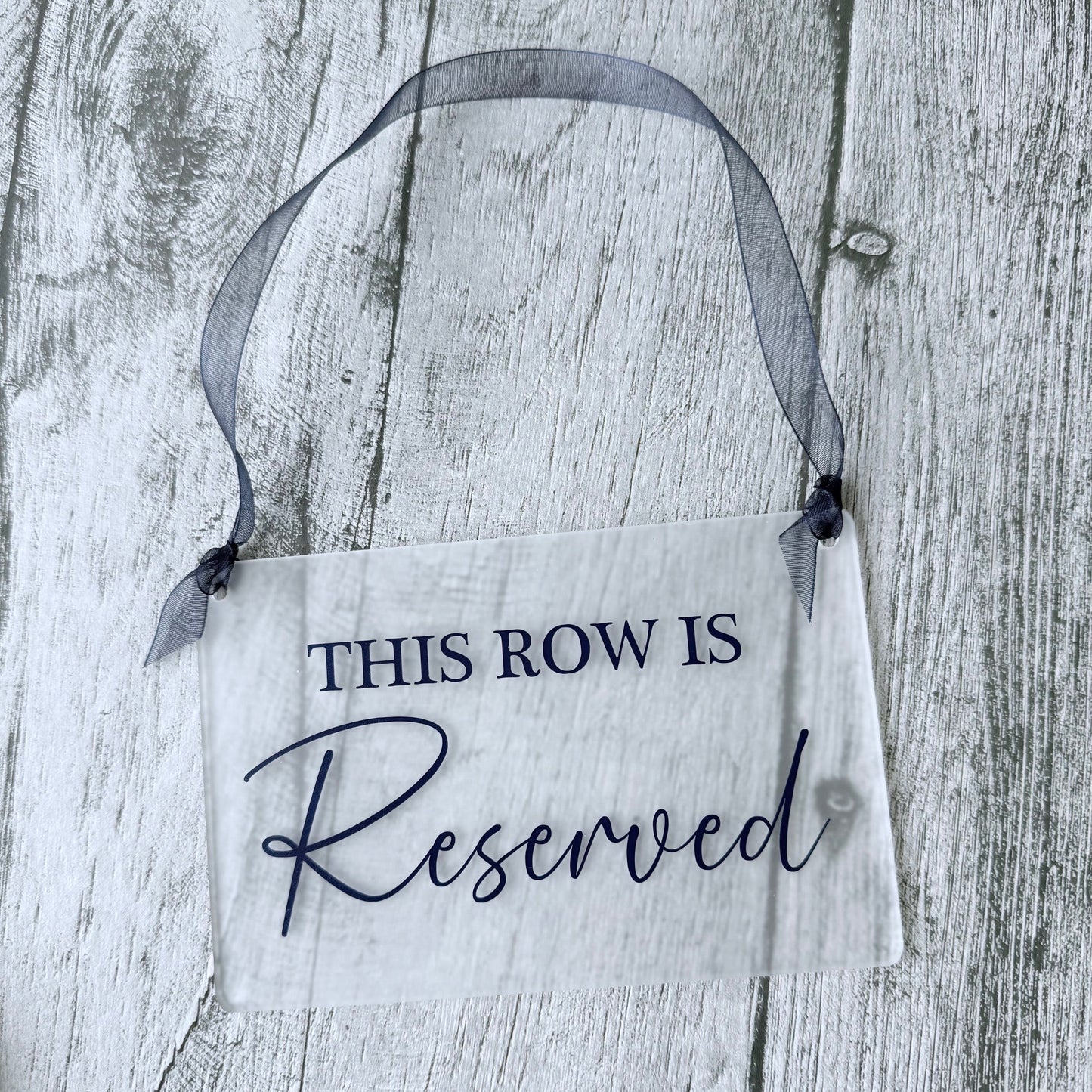 Acrylic “This Row Is Reserved” Sign – Elegant Wedding & Event Seating Sign